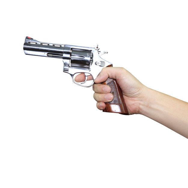 Hand holding a gun on white background